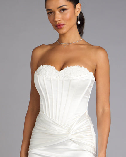 This prom dress, the Alexia Satin Lace Bustier Mini Dress , features a sleek, floor-length design with trend-forward details that capture the excitement of Prom 2026.