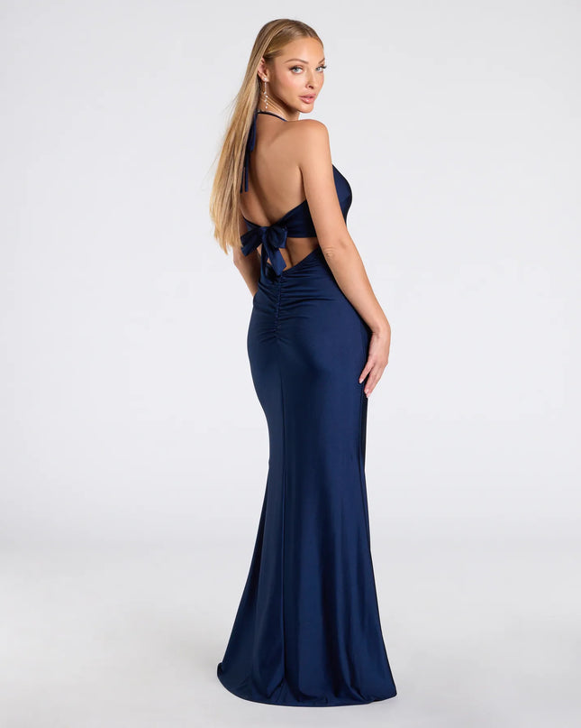 Step into the Prom 2026 dance in the Becky V-Neck Tie-Back Slit Mermaid Dress in navy, a stunning blue prom dress designed to complement any theme with its timeless allure and statement-making style.
