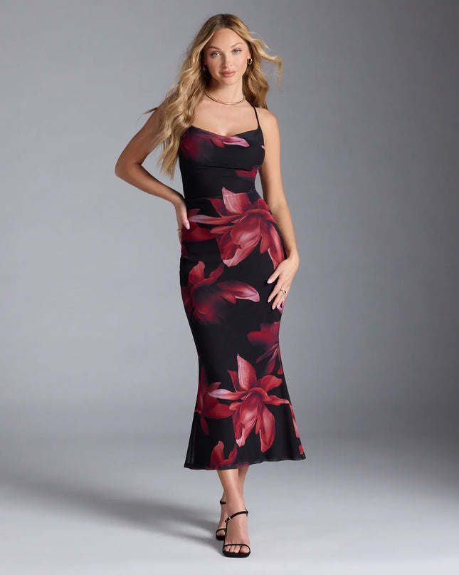 The Captivating Floral Mesh Lace-Up Midi Dress is your new go-to black dress—effortless, versatile, and made to update your fall style in seconds.