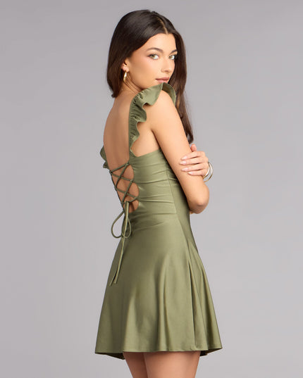Shop a mini dress like the Flirt Mode On Lace-Up Mini Dress in sage green with a curve-hugging shape, playful length, and chic detail for any occasion.