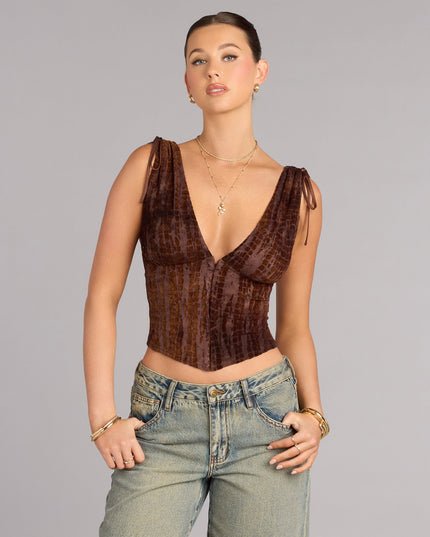 Create a sculpted look with the Caught Your Eye Flocked Velvet Corset Top in brown, a corset top featuring structured seams and a curve-hugging fit.