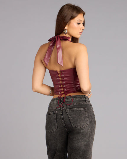 Sculpted to flatter, the Undeniable Flair Halter Corset Top is a burgundy corset top that creates a sleek sillhouette and brings trend-forward style to any look.