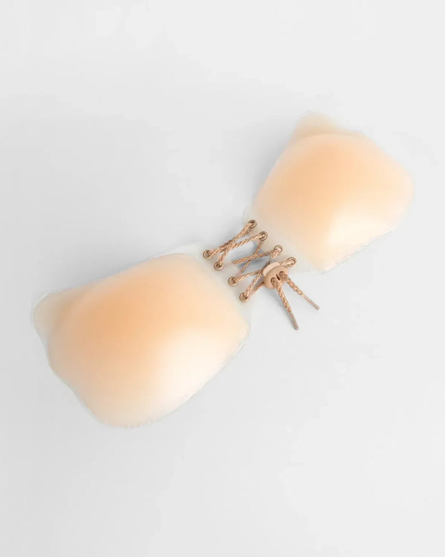 The Silicone Adhesive Lifting Bra in natural brings sleek style to any graduation outfit, from cap and gown to after-party.
