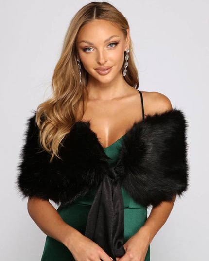 Refresh your wardrobe with the All Class Faux Fur Shawl, a black fashion jacket that adds statement style to every look.