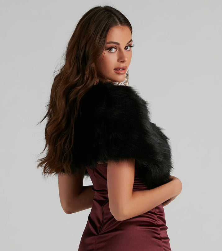 Get ready for any event with the Ms. Diva Faux Fur Shawl in black, an essential start to creating a versatile outfit for women for grad parties, cocktail hours, or nights out.