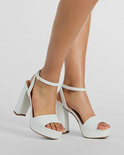 Style made simple with the Ready To Slay Platform Heels in white, trendy women’s shoes that take your outfit from basic to bold in one step.