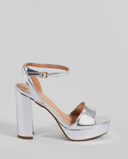 Turn heads in the Ready To Slay Platform Heels, silver heels showcasing a fresh trend or stylish detail made to elevate your full Windsor fit.
