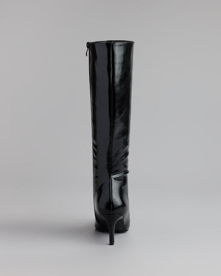 This piece brings trend-right energy to the Sleek Stance Faux Leather Stiletto Boots, perfect for 2026 outfits that stand out.